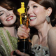 Nominee for best supporting actress Emma Stone embraces best actress winner Julianne Moore at the Governor's Ball after the 87th Oscars Feb. 22, 2015, in Hollywood, Calif.
VALERIE MACON/AFP/Getty Images